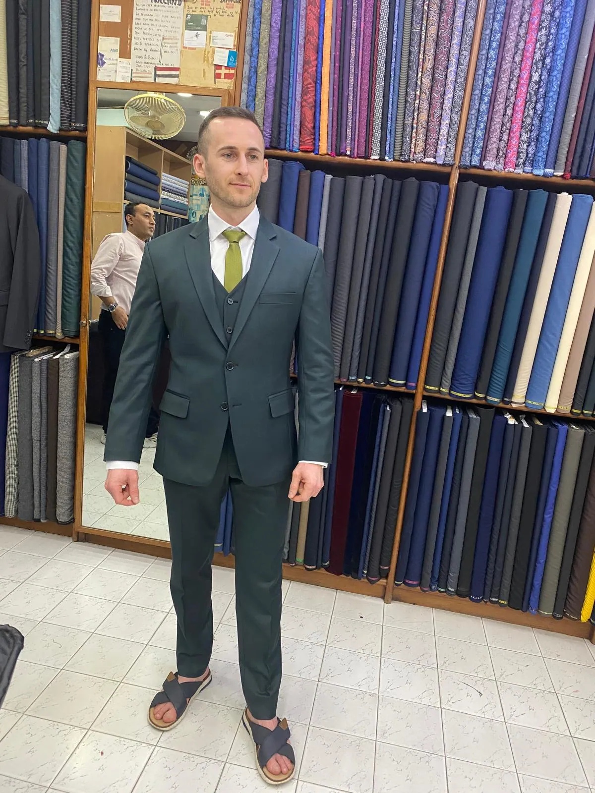 Groom in a wedding suit indoors
